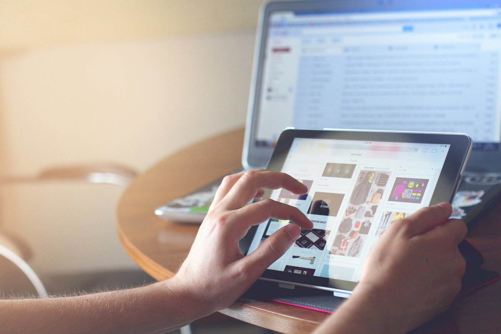 person holding black iPad, User-Generated Content